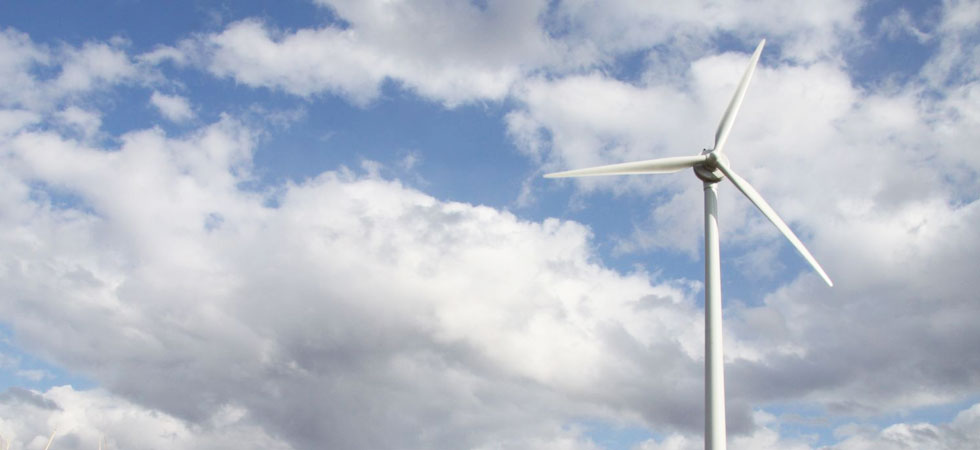  Wind mill generator in an open field